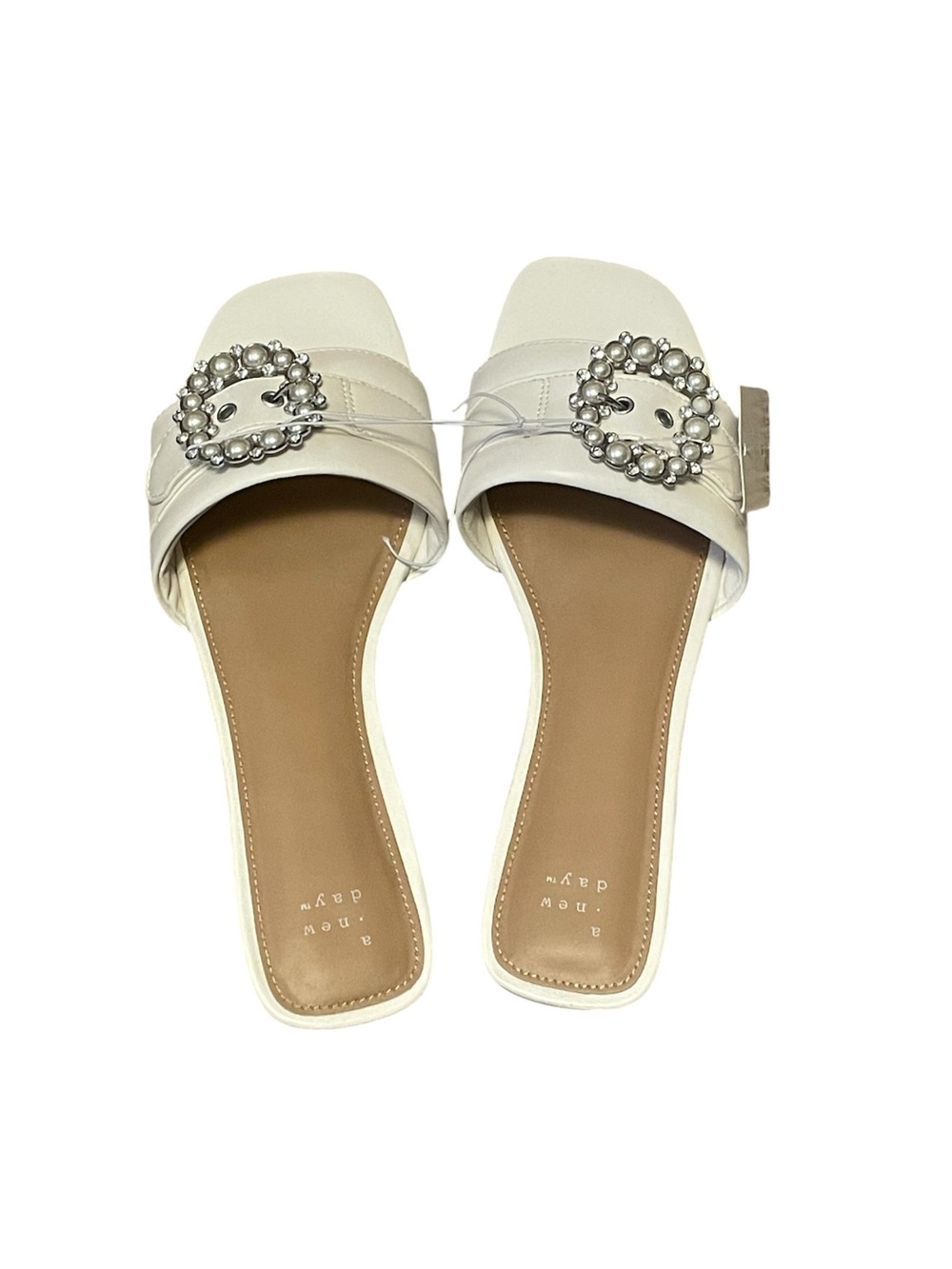 Women’s White Slide Sandals with Decorative Silver Buckle